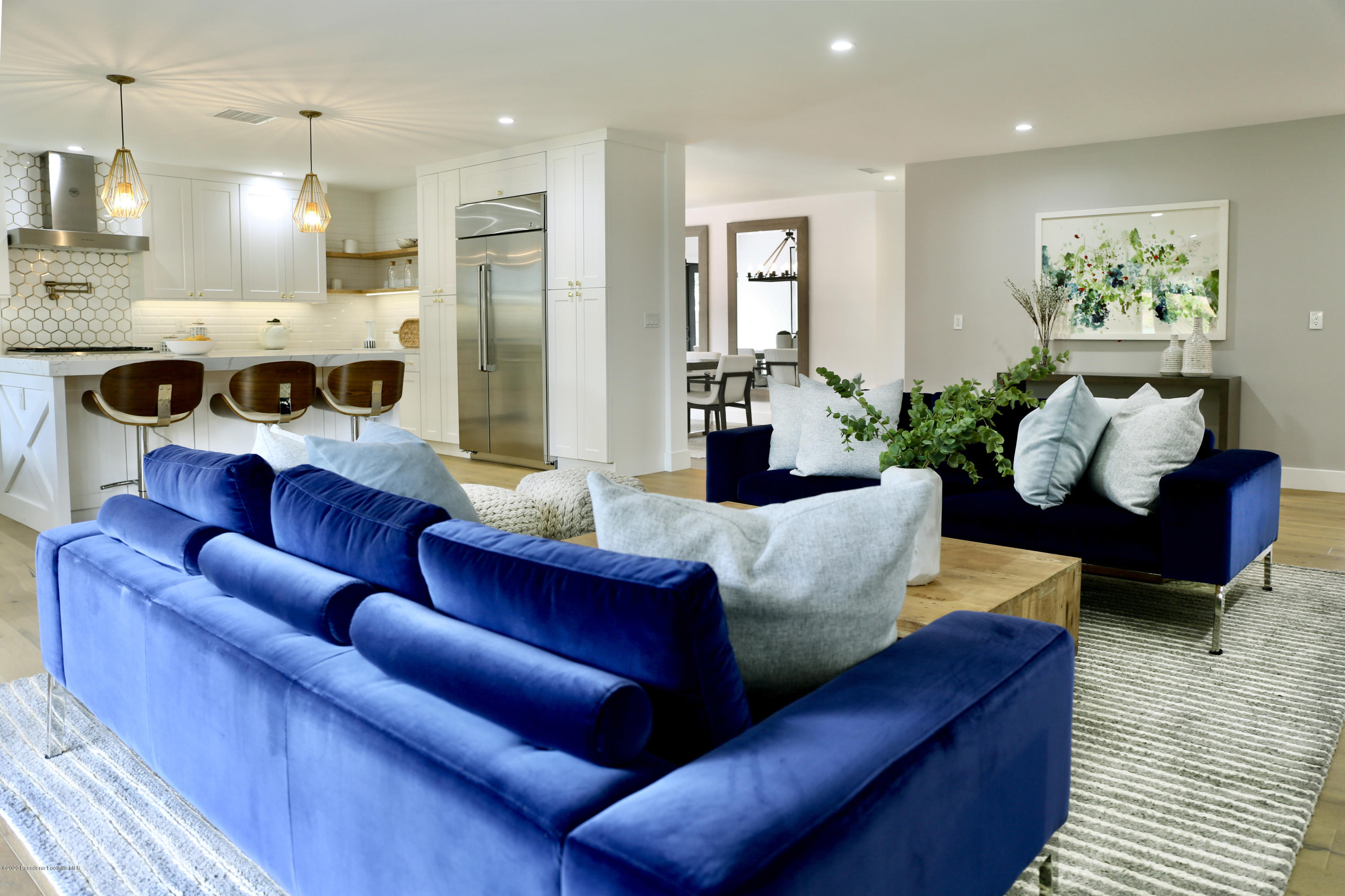 3665 Thorndale Road Pasadena, CA 91107 - Photo 12 of 45 a living room with furniture and a chandelier