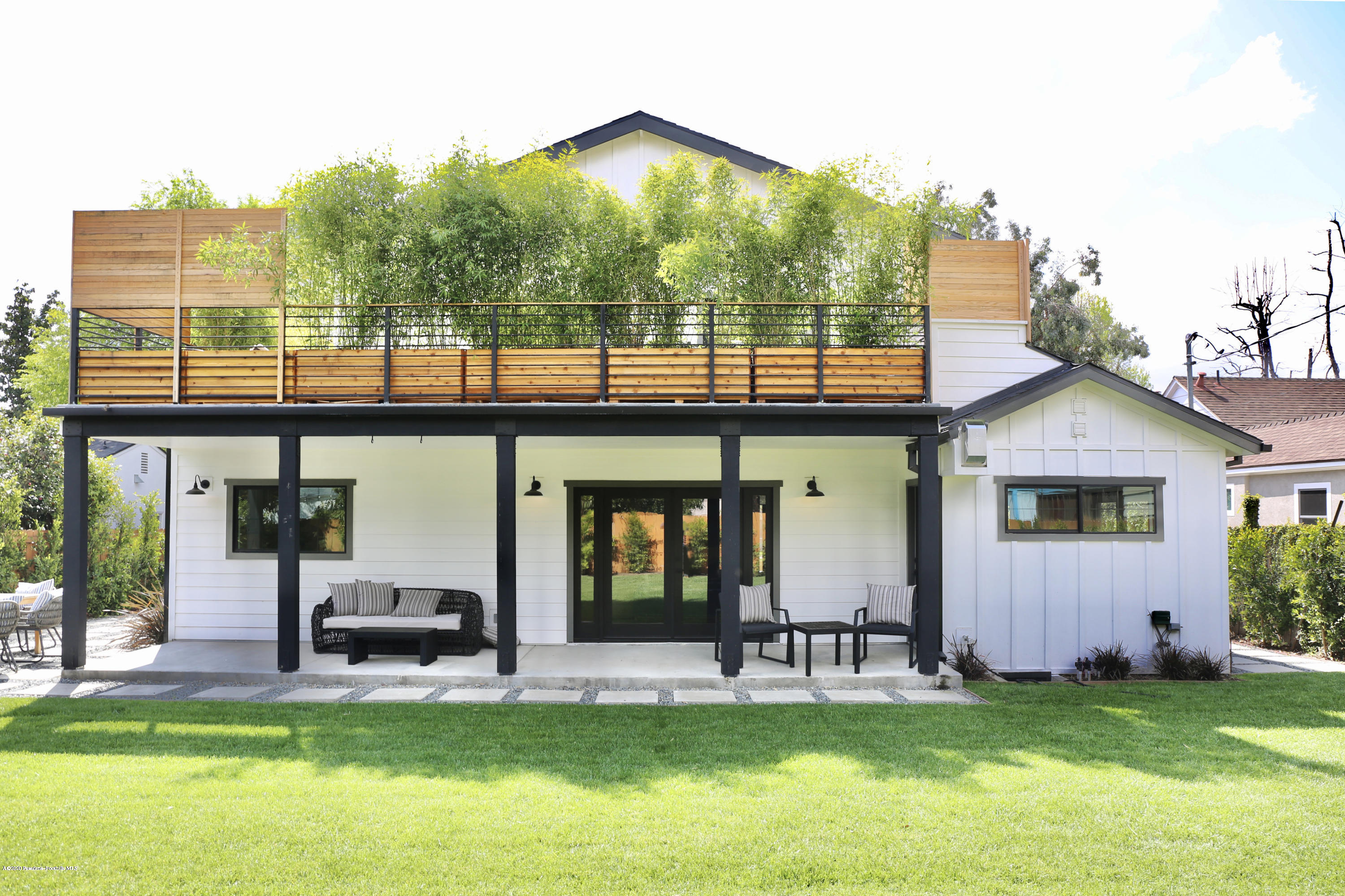 3665 Thorndale Road Pasadena, CA 91107 - Photo 14 of 45 a view of a house with a yard and sitting area