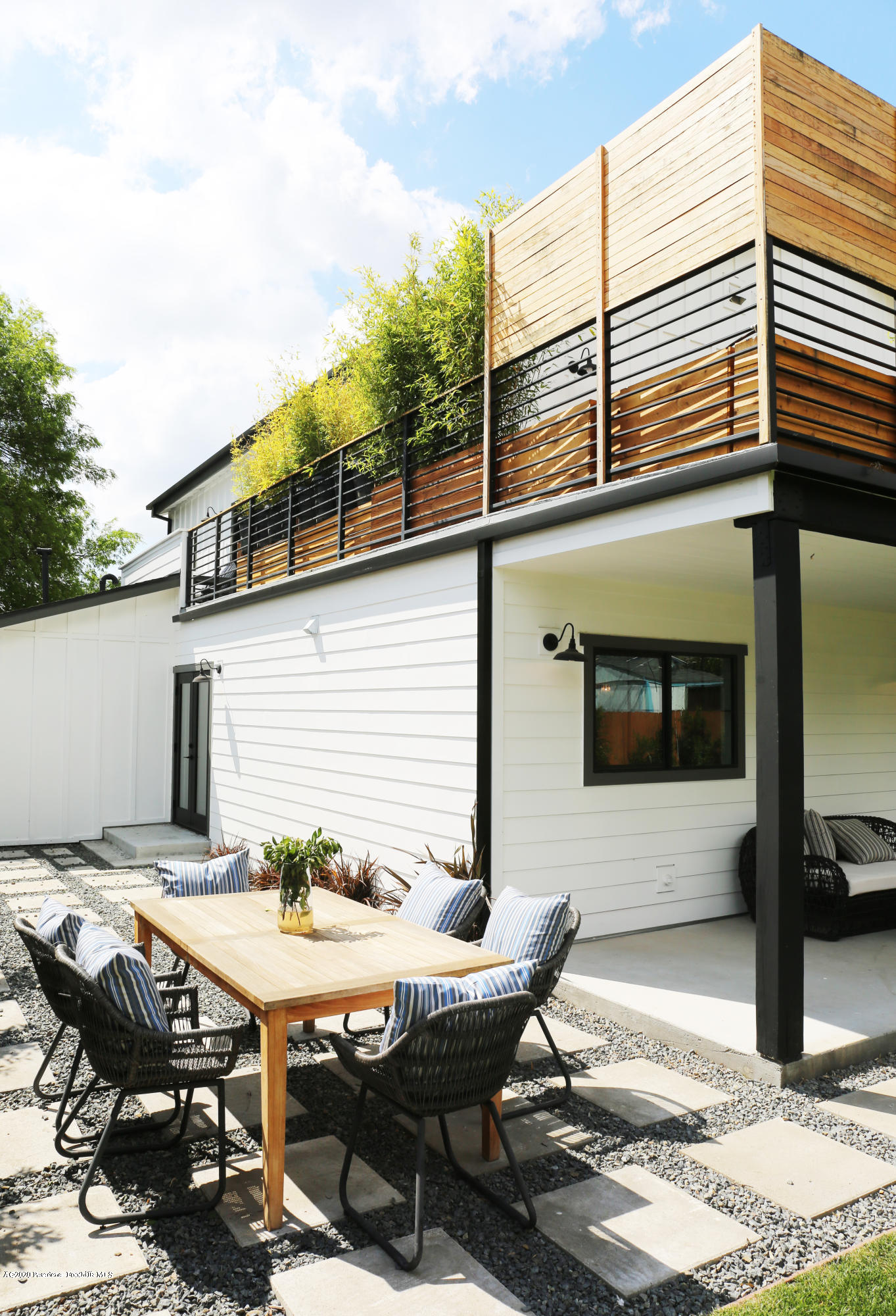 3665 Thorndale Road Pasadena, CA 91107 - Photo 15 of 45 a backyard of a house with table and chairs