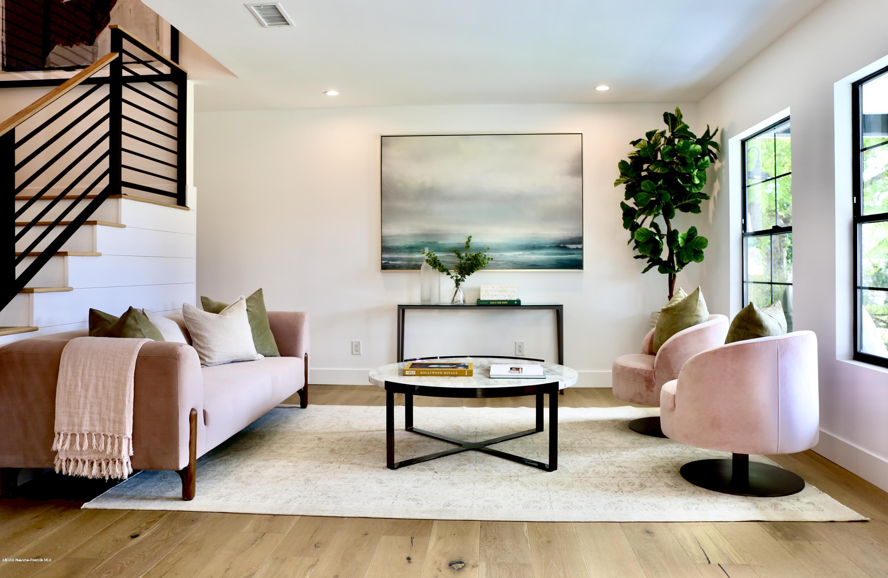 3665 Thorndale Road Pasadena, CA 91107 - Photo 3 of 45 a living room with furniture and a potted plant