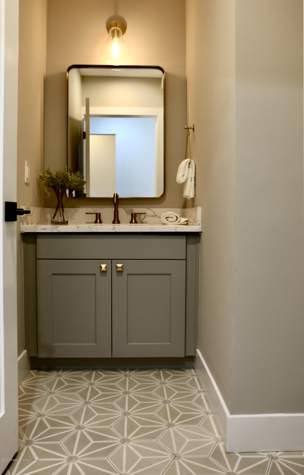 3665 Thorndale Road Pasadena, CA 91107 - Photo 22 of 45 a bathroom with a sink and a mirror