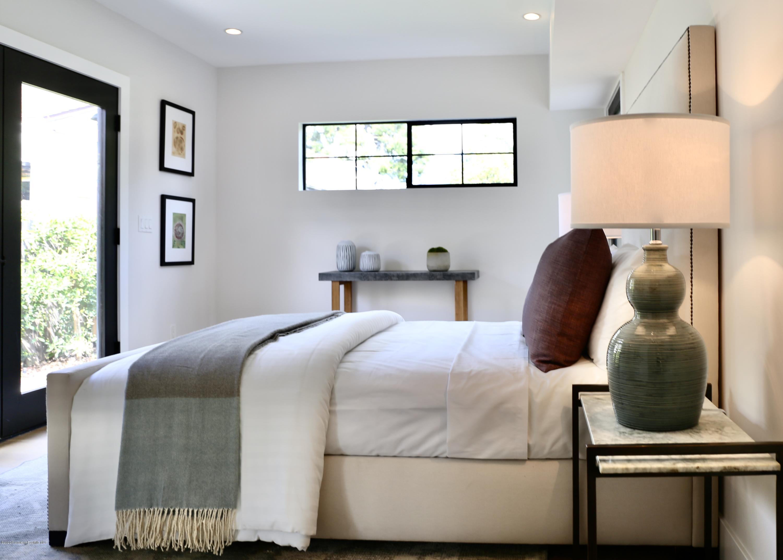 3665 Thorndale Road Pasadena, CA 91107 - Photo 25 of 45 a bedroom with a bed and window