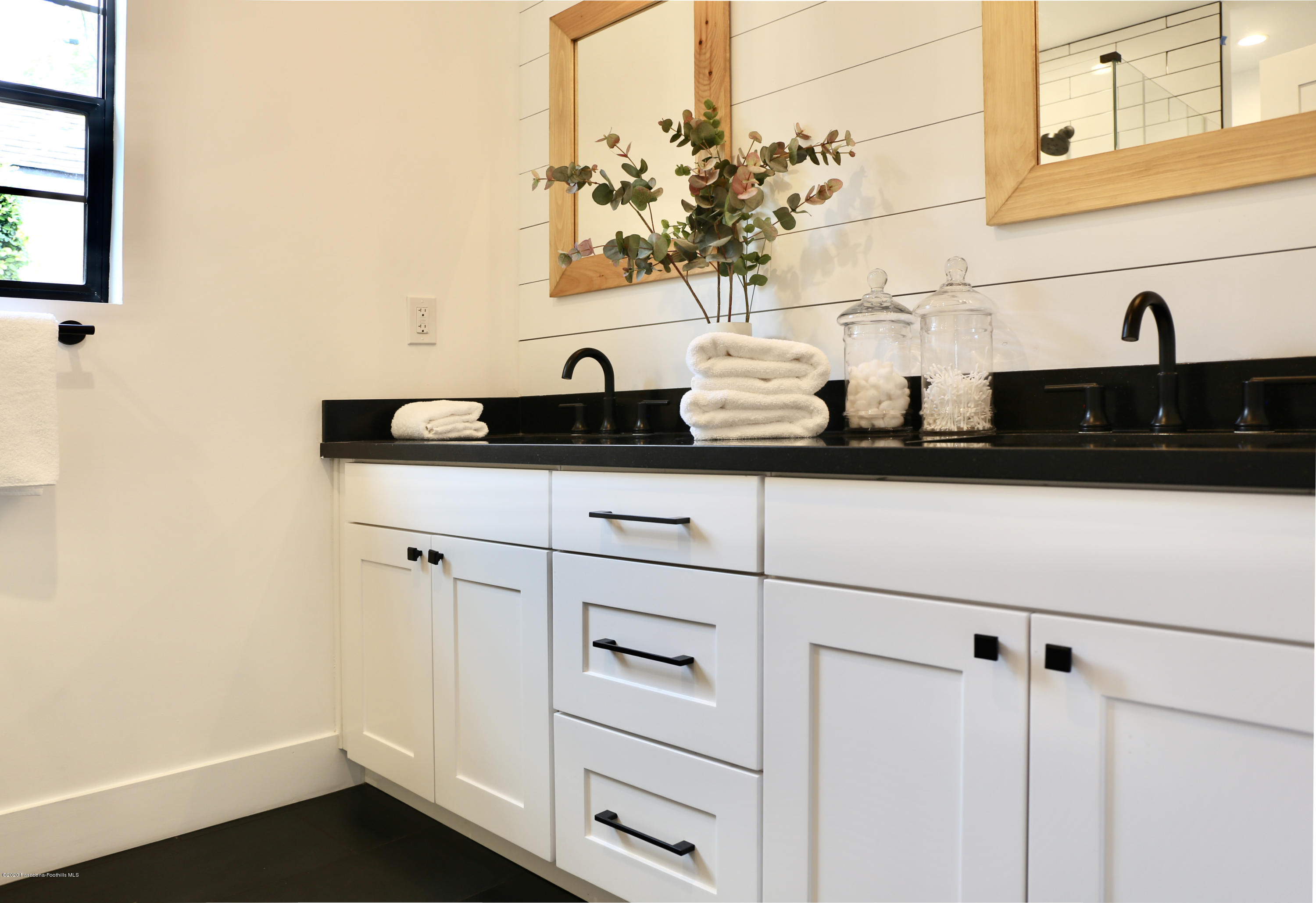 3665 Thorndale Road Pasadena, CA 91107 - Photo 26 of 45 a sink with a potted plant on it and a wooden floor