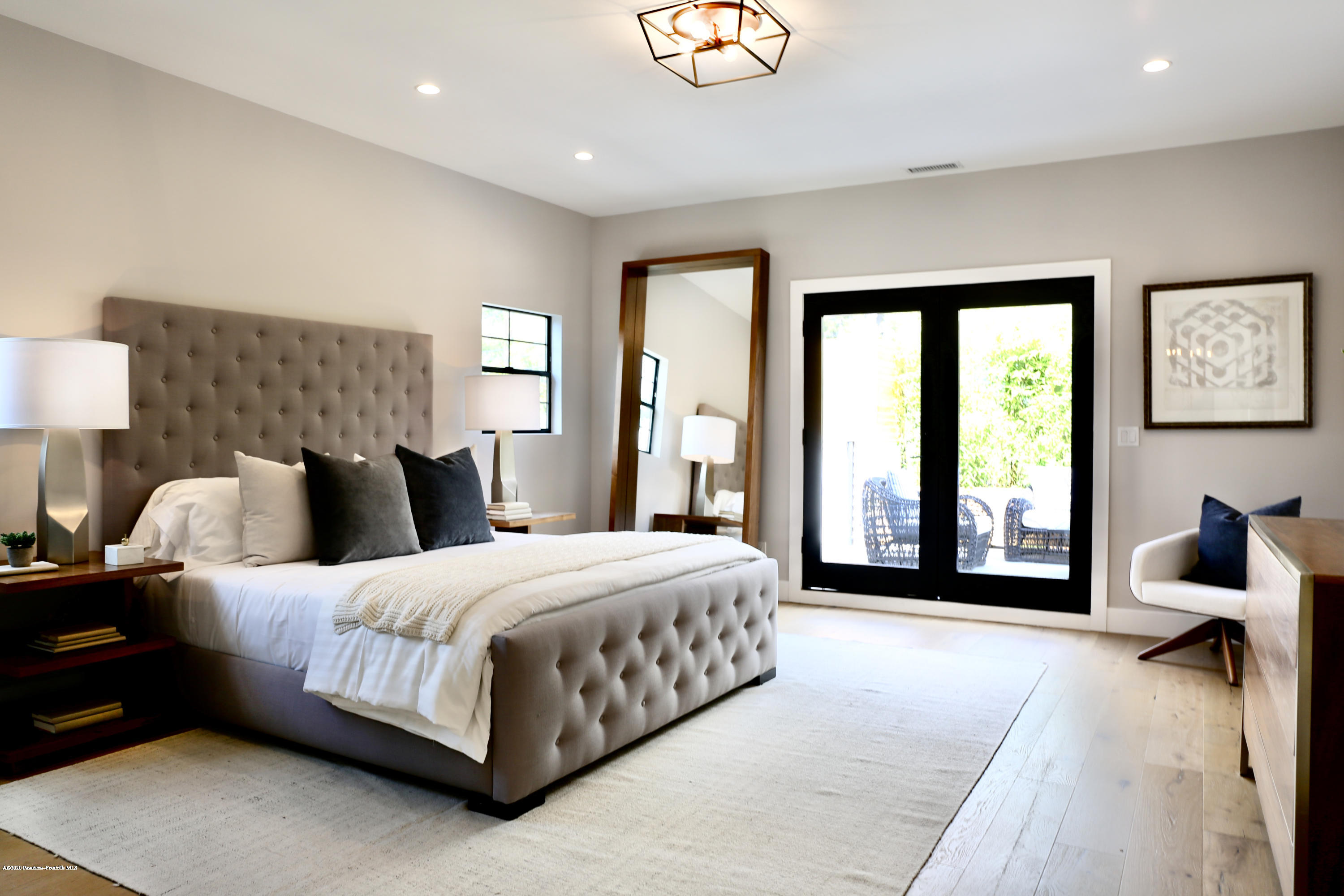 3665 Thorndale Road Pasadena, CA 91107 - Photo 29 of 45 a bedroom with a large bed and a large window