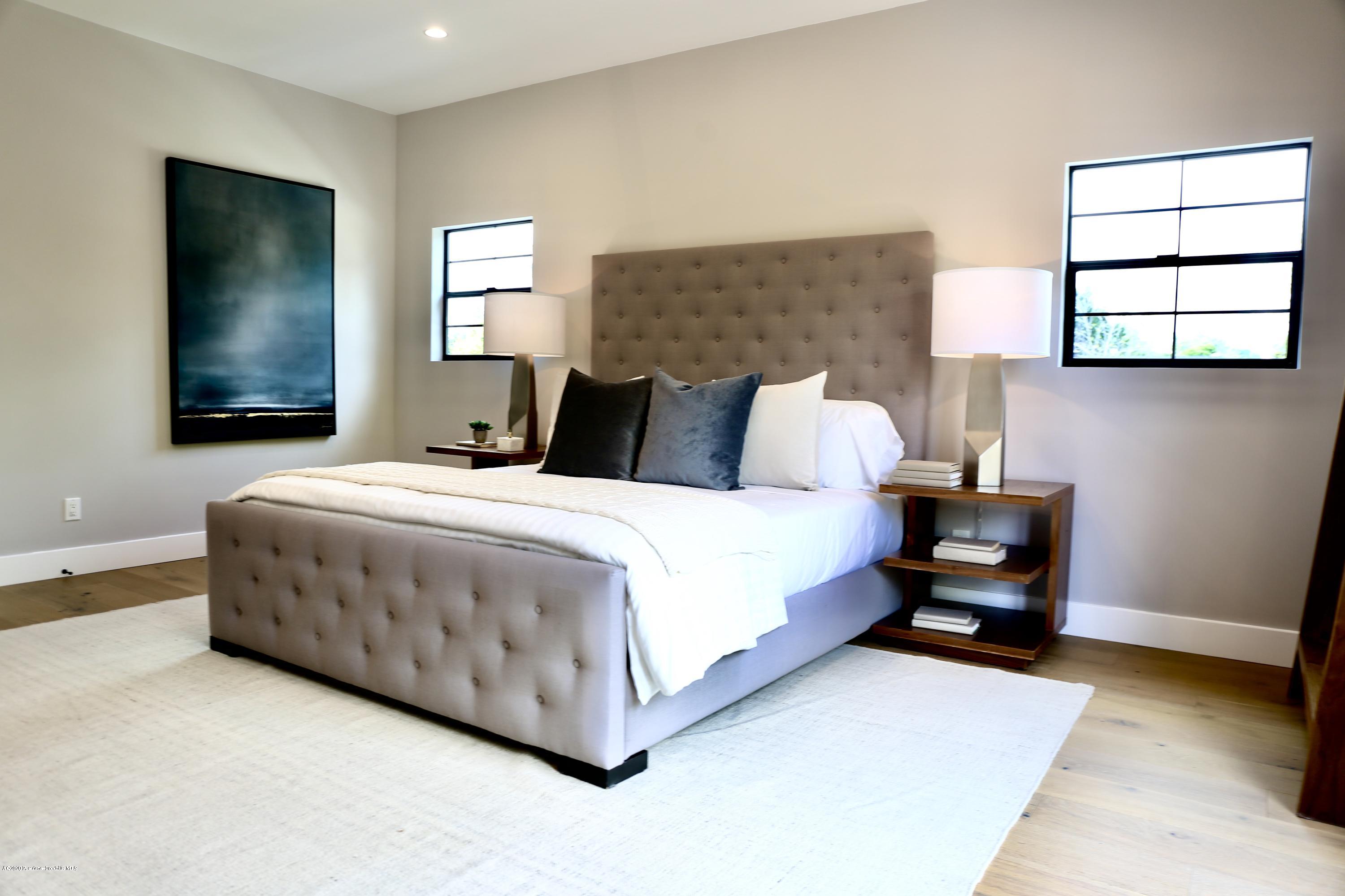 3665 Thorndale Road Pasadena, CA 91107 - Photo 30 of 45 a bedroom with a bed and a window