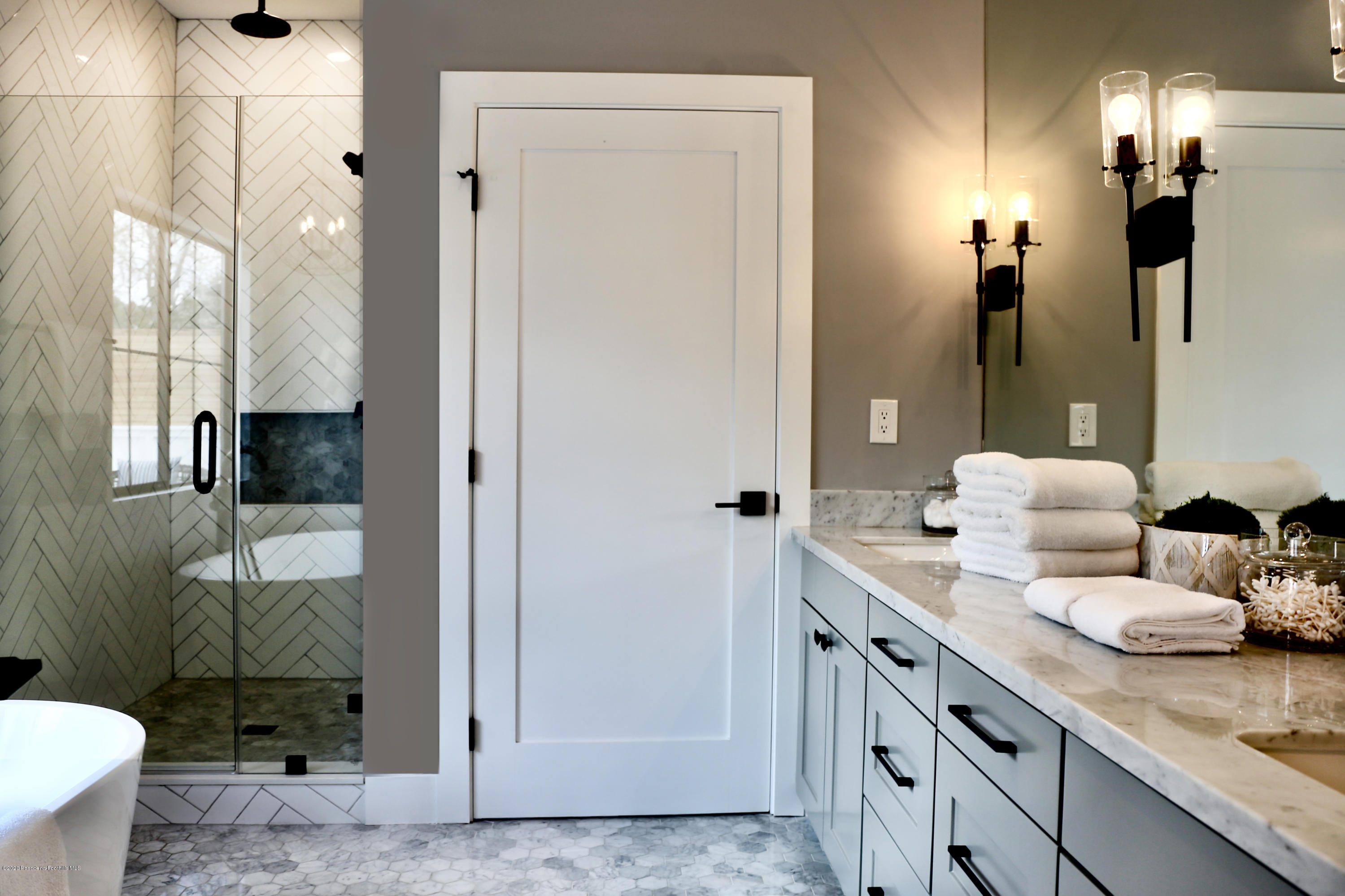 3665 Thorndale Road Pasadena, CA 91107 - Photo 31 of 45 a spacious bathroom with a granite countertop sink and a mirror