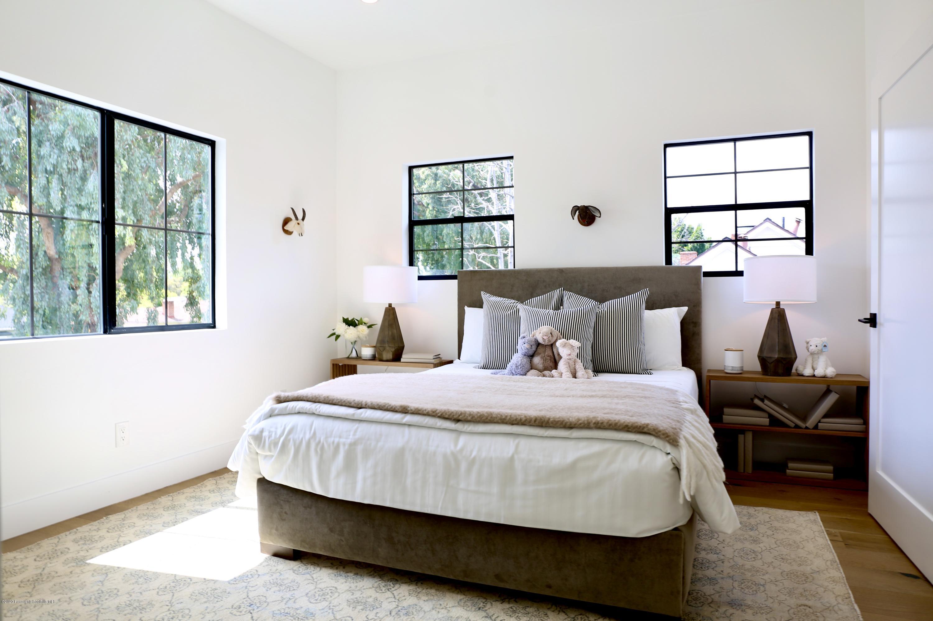 3665 Thorndale Road Pasadena, CA 91107 - Photo 36 of 45 a bedroom with a bed and a window