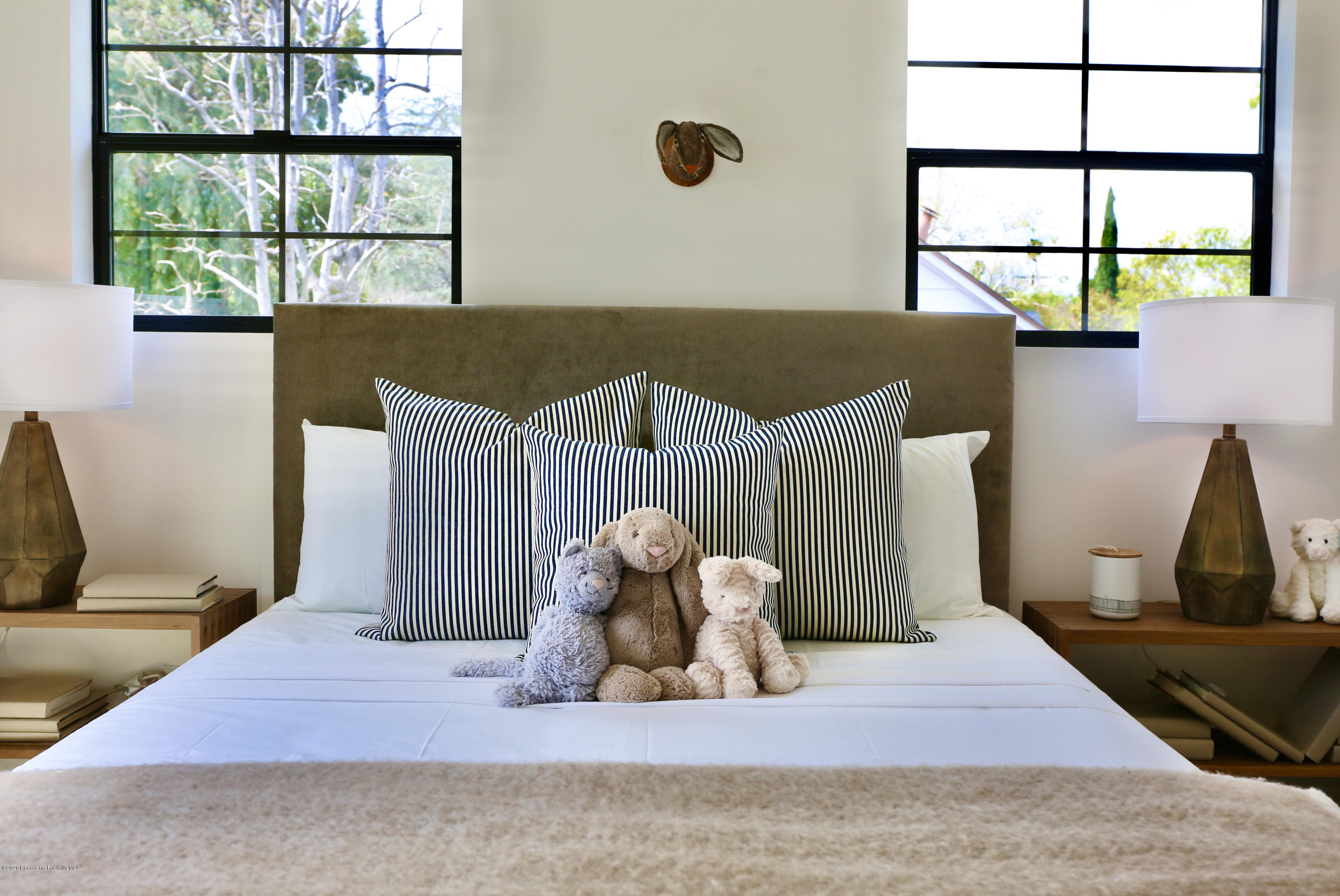 3665 Thorndale Road Pasadena, CA 91107 - Photo 37 of 45 a bedroom with a bed and window