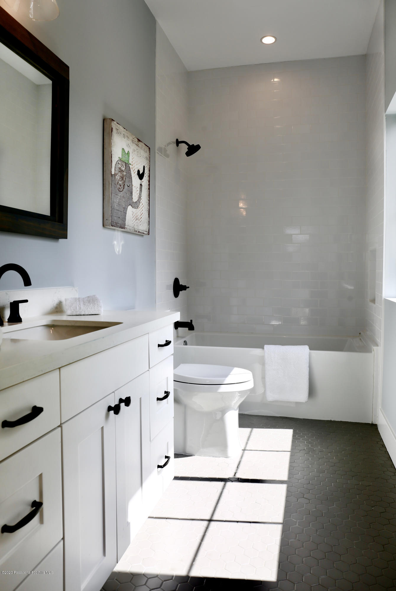 3665 Thorndale Road Pasadena, CA 91107 - Photo 39 of 45 a bathroom with a sink a toilet and mirror