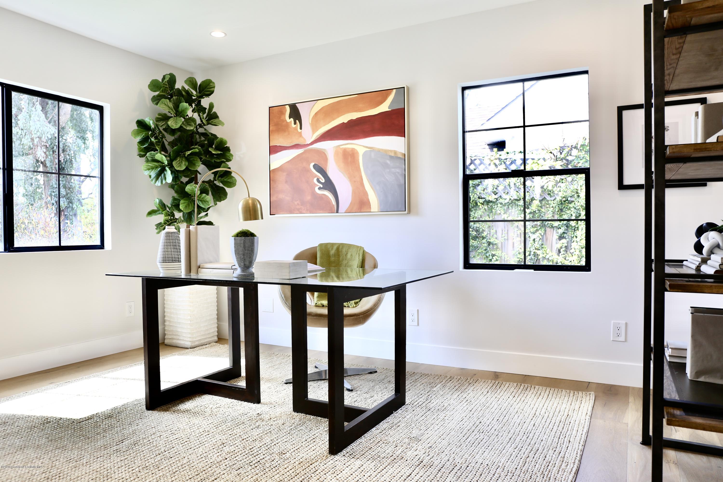 3665 Thorndale Road Pasadena, CA 91107 - Photo 7 of 45 a view of entryway with wooden floor and front door