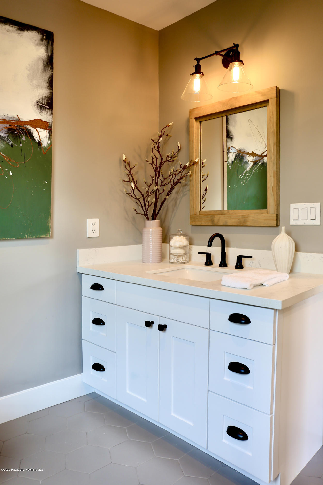 3665 Thorndale Road Pasadena, CA 91107 - Photo 9 of 45 a bathroom with a sink vanity and mirror