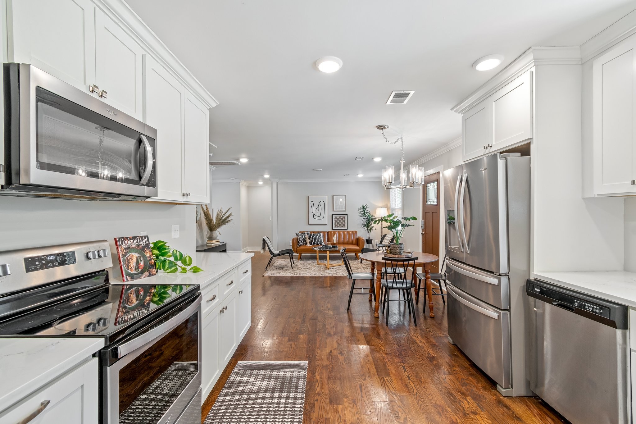 884 Kipling Drive Nashville, TN 37217 - Photo 15 of 40 a kitchen with stove cabinets and stainless steel appliances