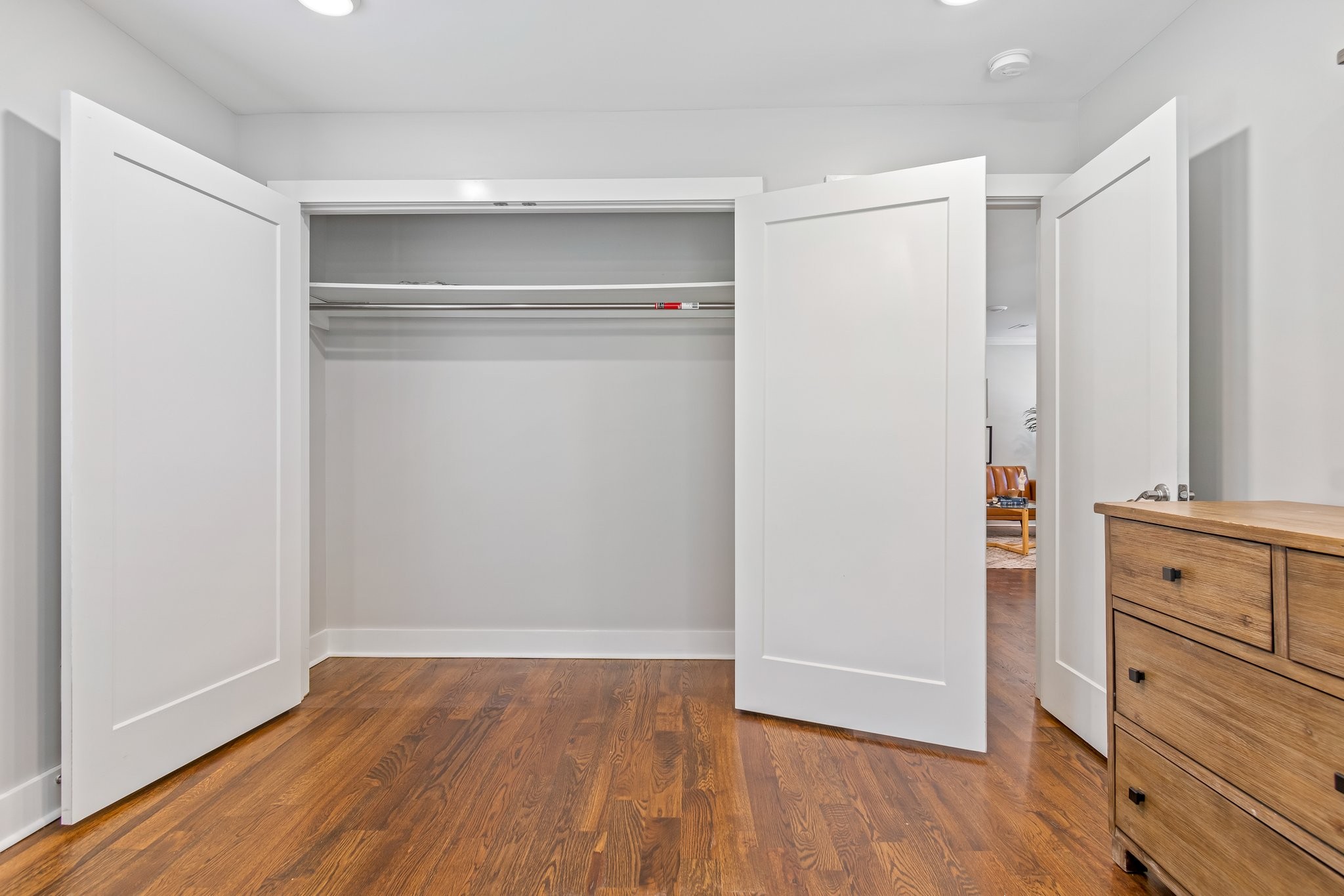 884 Kipling Drive Nashville, TN 37217 - Photo 31 of 40 a view of an empty walk in closet with wooden floor