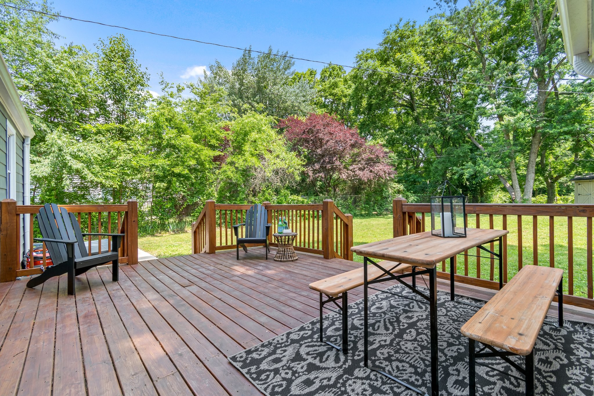 884 Kipling Drive Nashville, TN 37217 - Photo 36 of 40 a view of a chairs and table on the wooden deck