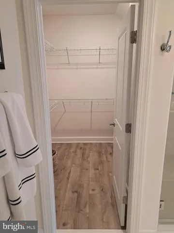 a bathroom with a double vanity sink mirror and