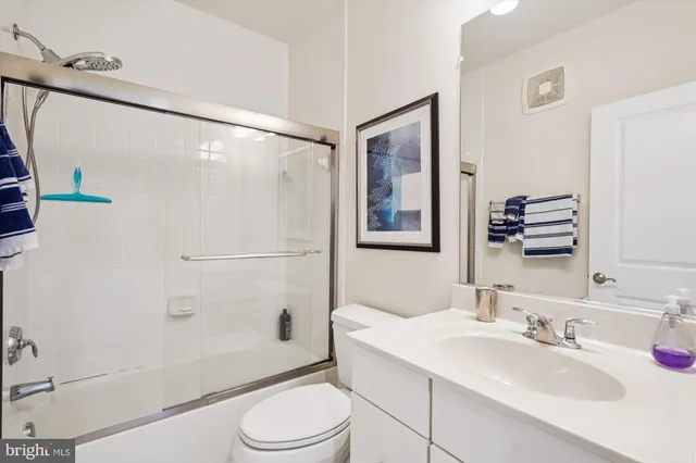 a view of a storage & utility room with washer and dryer