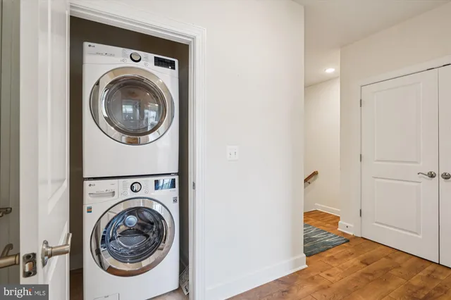 a view of a house with swimming pool and sitting area