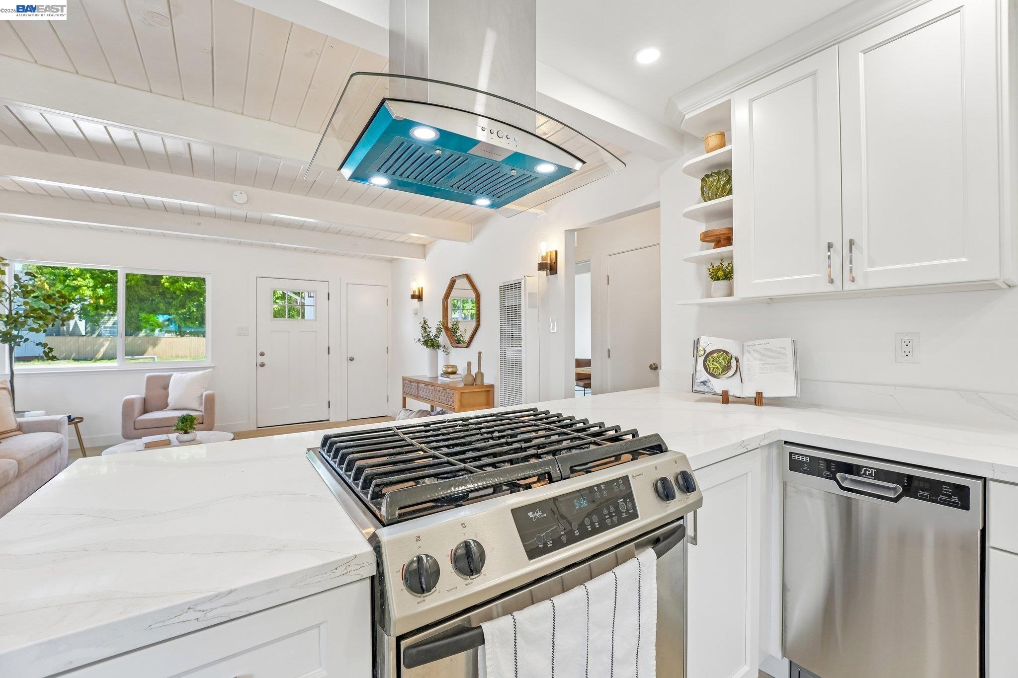 606 West 9th Street Santa Rosa, CA 95401 - Photo 29 of 52 a kitchen with a stove a sink and a window