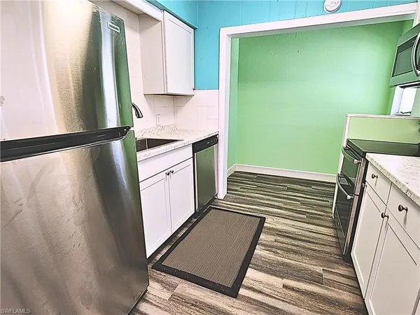 a view of kitchen with washer and dryer