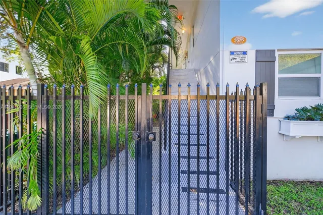 a view of a backyard with plants