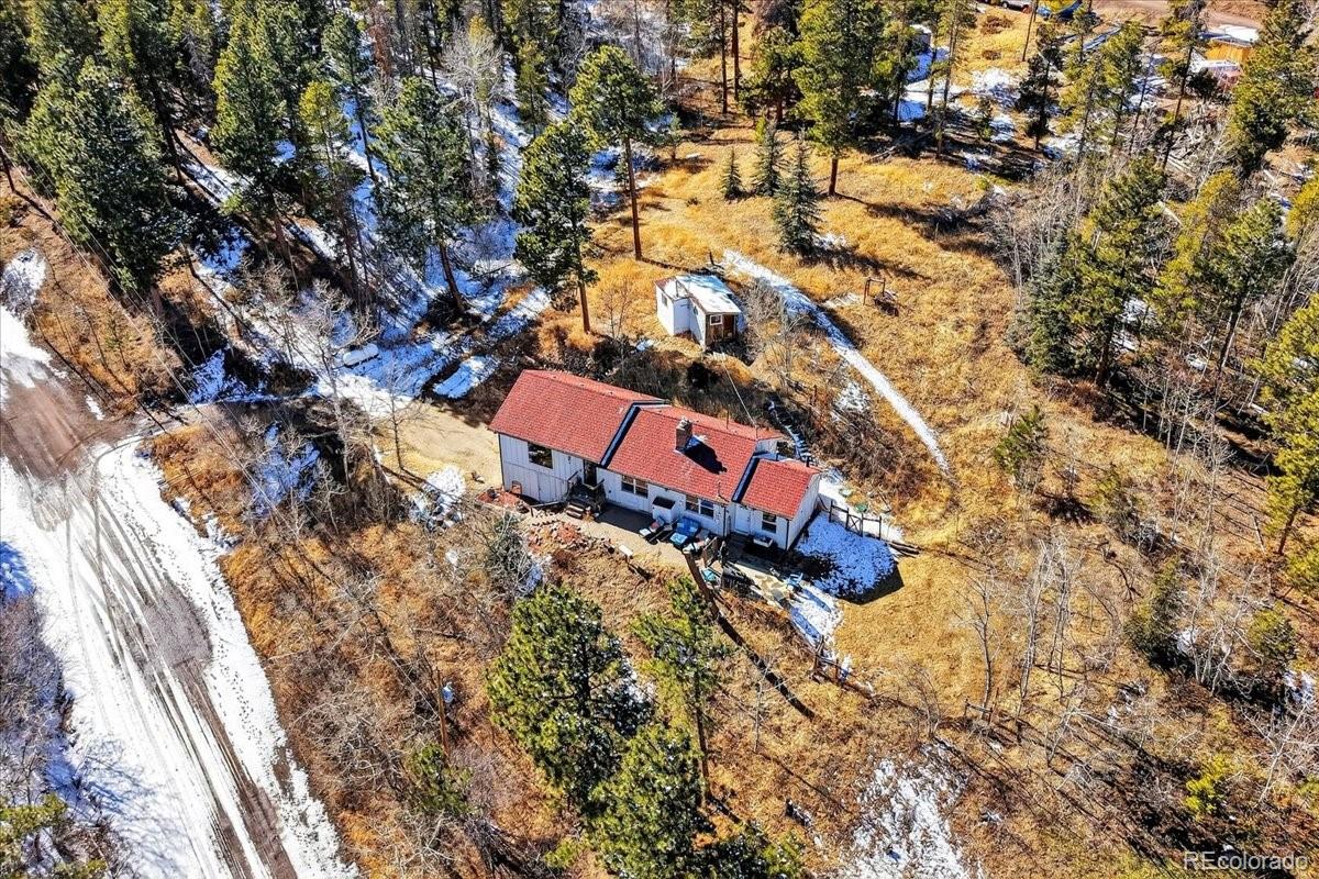 11827 Brook Road Golden, CO 80403 - Photo 26 of 32 an aerial view of residential houses with outdoor space