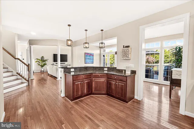 a bathroom with a double vanity sink mirror and shower