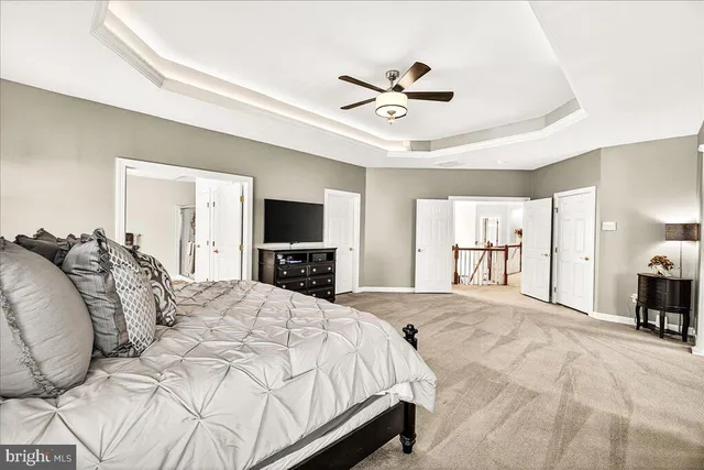 a view of a house with a yard in front of it