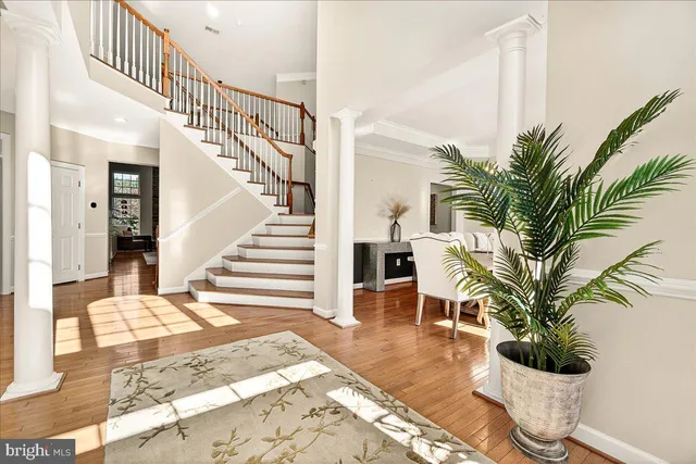 a view of a livingroom with furniture and a window