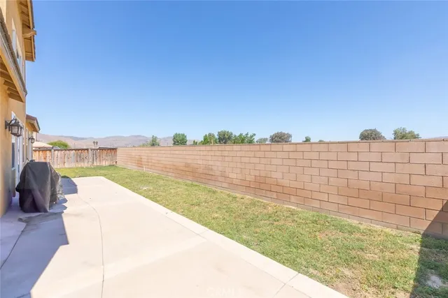 a view of swimming pool with outdoor space and seating area
