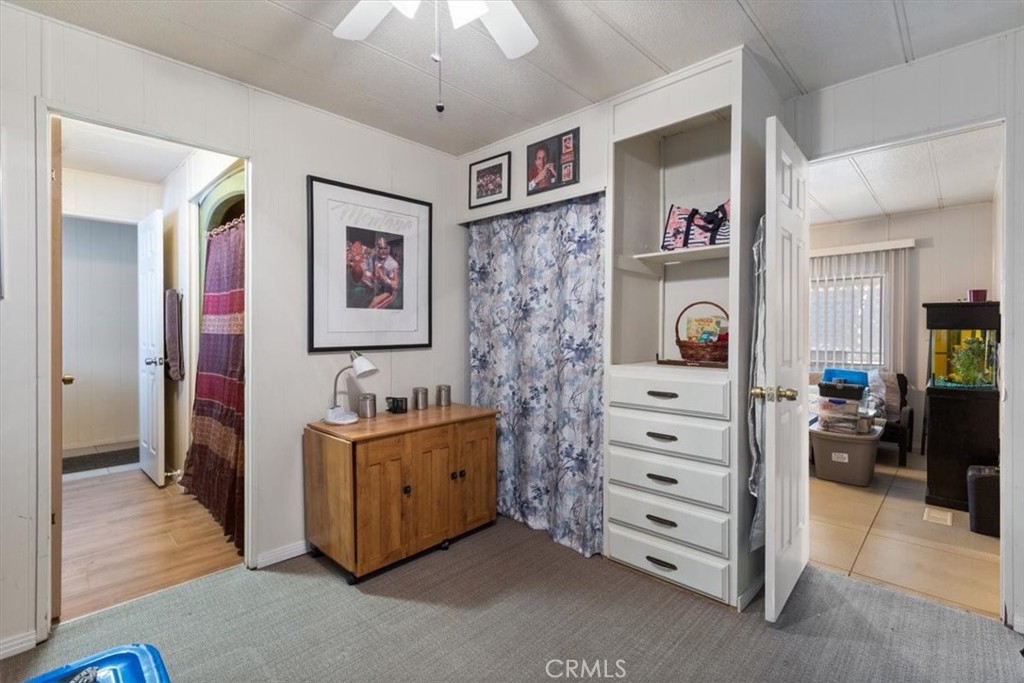 300 North Rampart Street, Unit 195 Orange, CA 92868 - Photo 22 of 25 a view of room with cabinet and ceiling fan