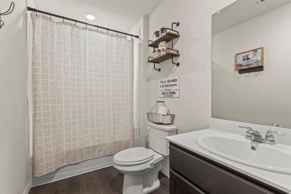 113 Keller Road Royse City, TX 75189 - Photo 11 of 25 a bathroom with a sink a toilet and shower