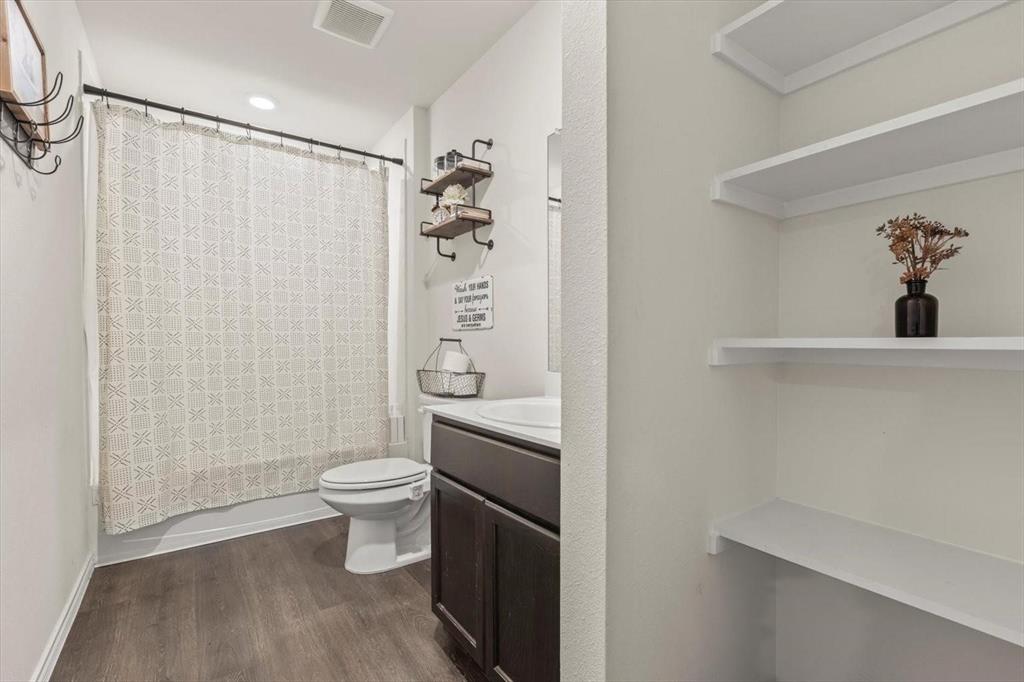 113 Keller Road Royse City, TX 75189 - Photo 12 of 25 a bathroom with a toilet and a shower