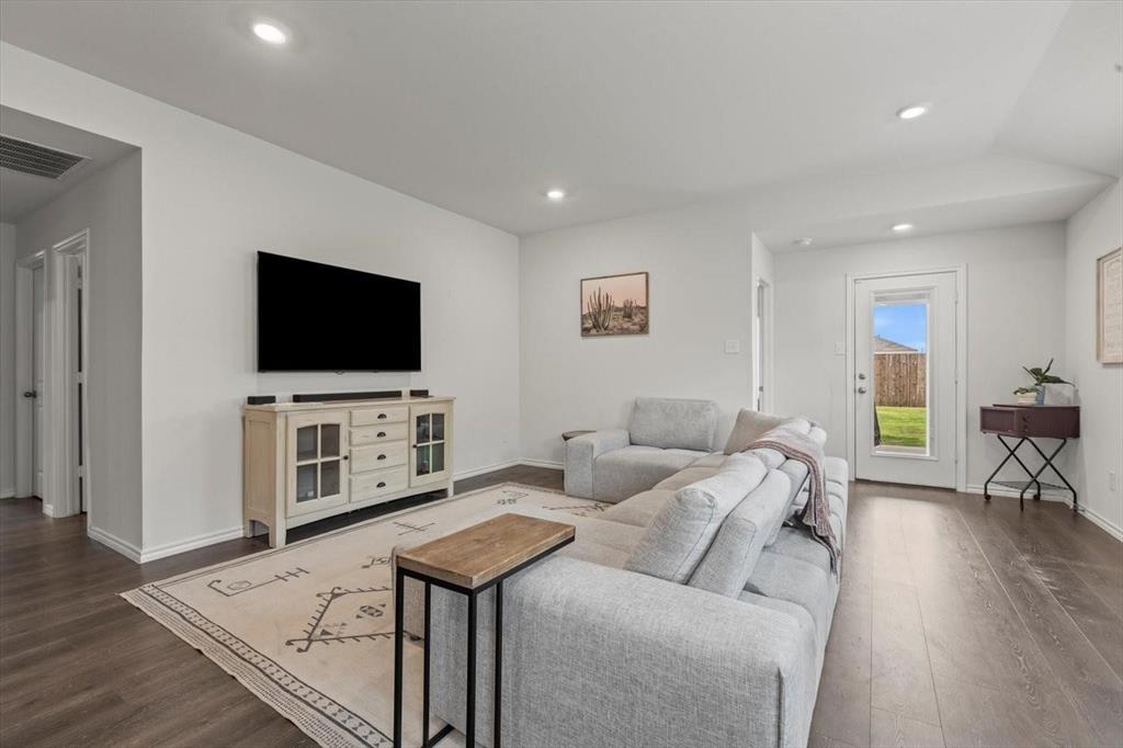 113 Keller Road Royse City, TX 75189 - Photo 16 of 25 a living room with furniture and a flat screen tv