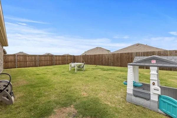 a view of an outdoor space and a yard