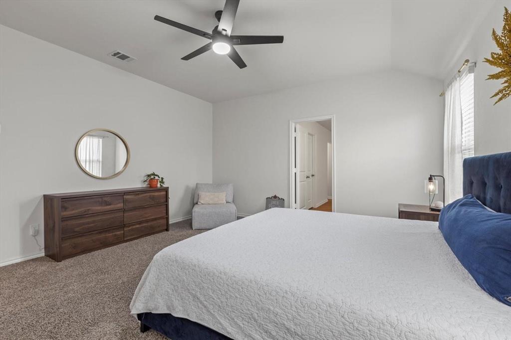 113 Keller Road Royse City, TX 75189 - Photo 7 of 25 a bedroom with bed and wooden floor