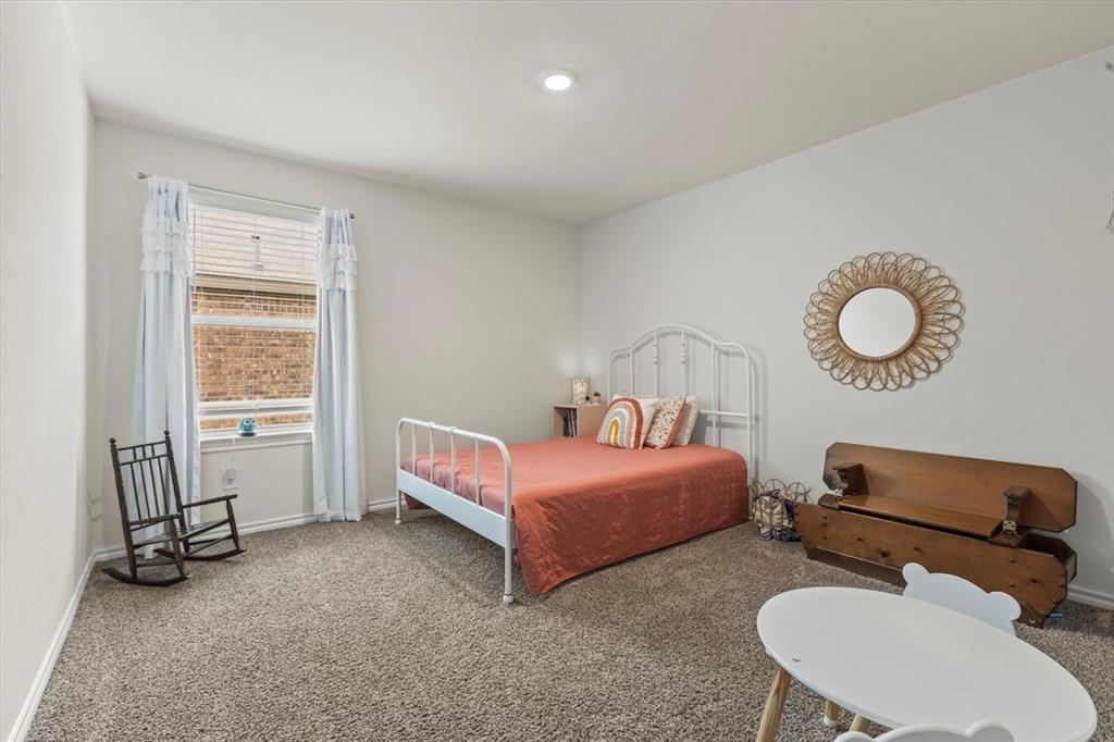 113 Keller Road Royse City, TX 75189 - Photo 9 of 25 a bedroom with bed and a window