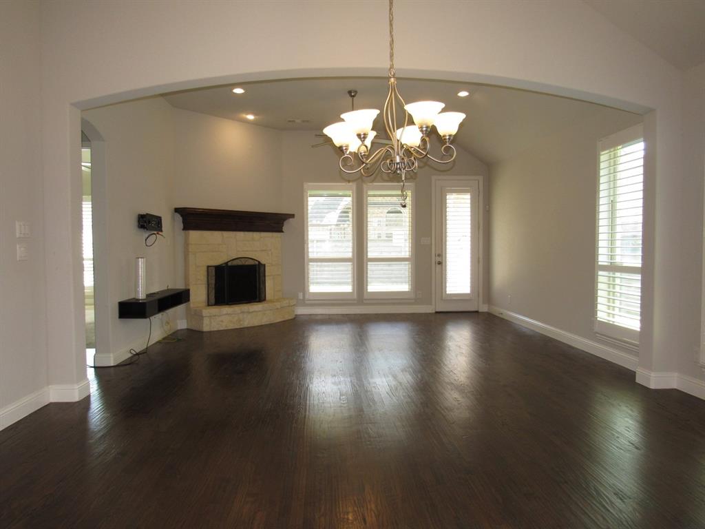 816 Pier Street Little Elm, TX 76227 - Photo 15 of 27 Unfurnished dining area open to the large living room