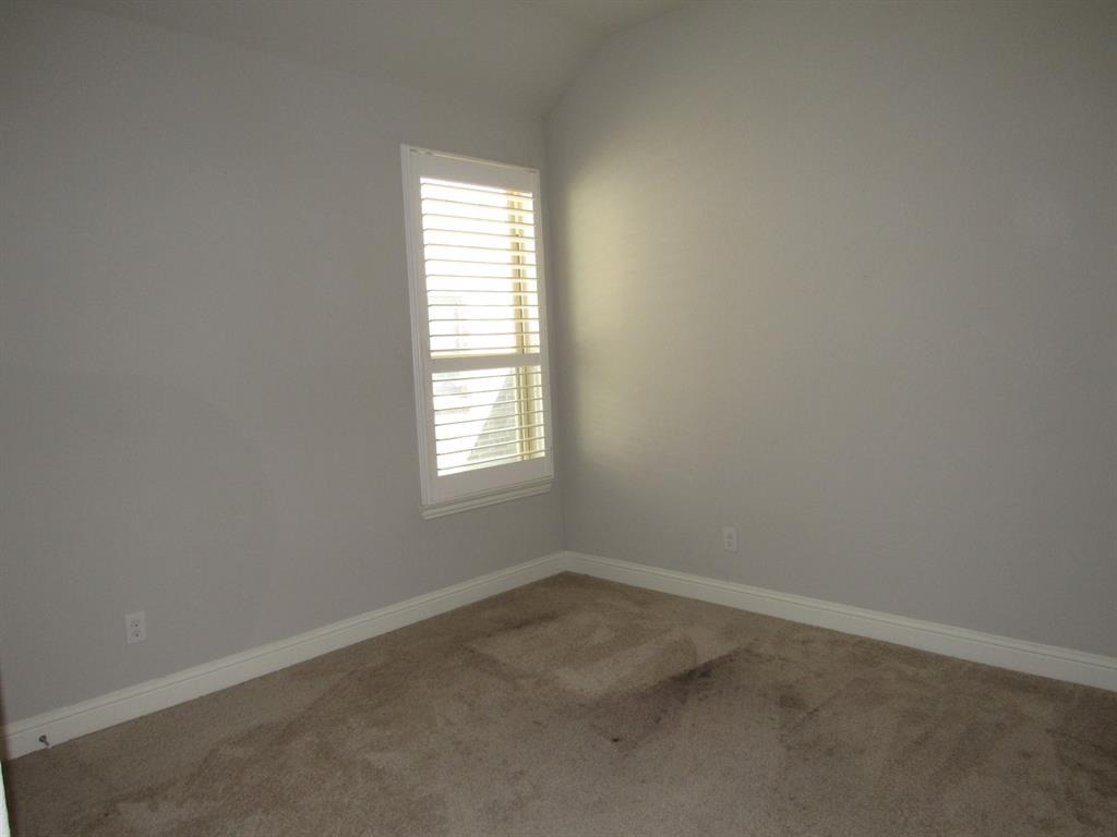 816 Pier Street Little Elm, TX 76227 - Photo 20 of 27 Full bathroom for bedrooms 3 and 4 with a textured wall, vanity, and bathtub / shower combination
