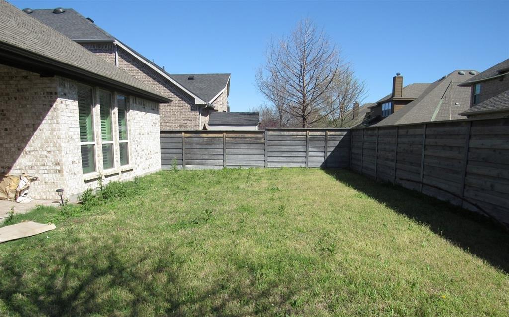 816 Pier Street Little Elm, TX 76227 - Photo 6 of 27 View of fenced backyard