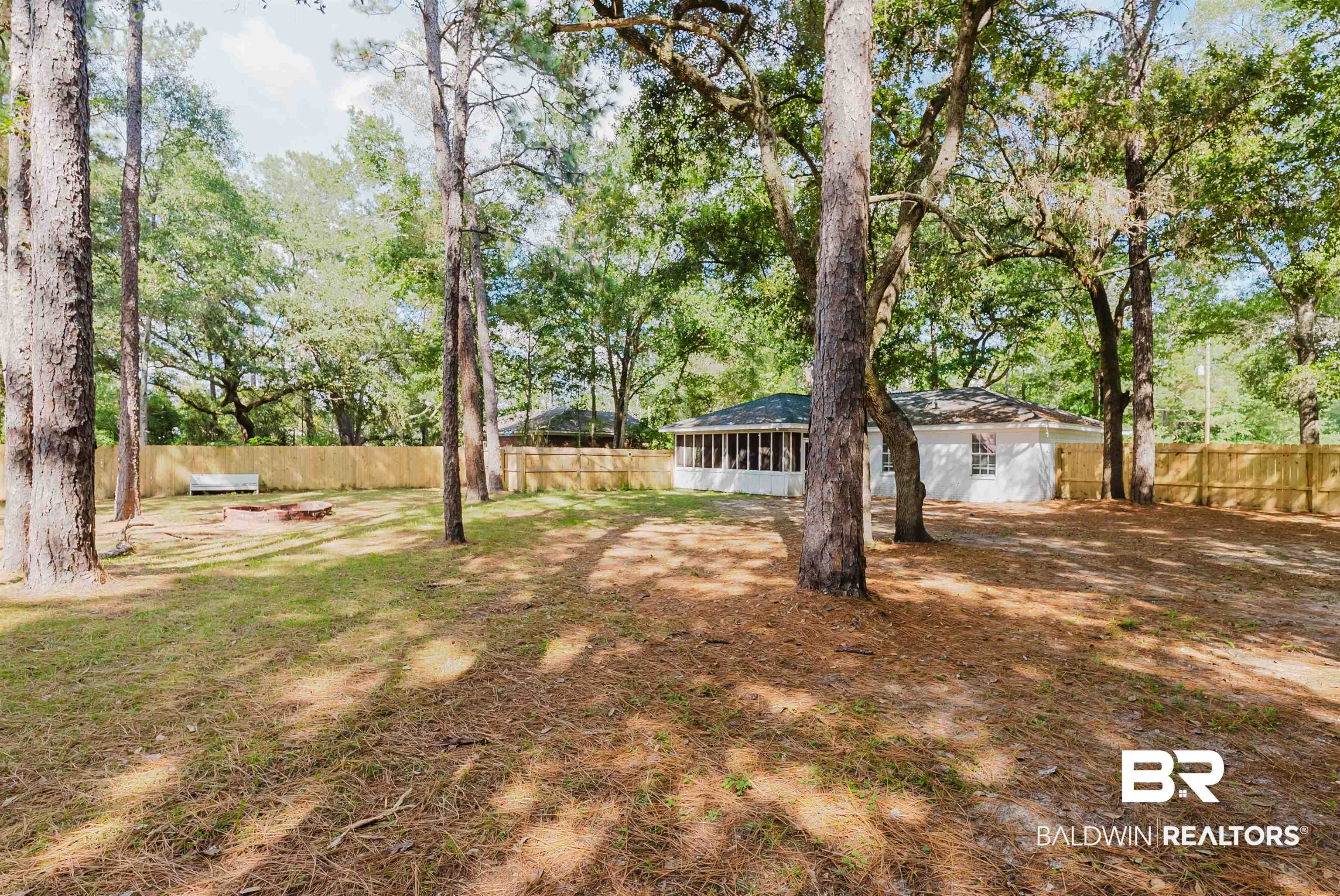 14185 Jackson Lane Foley, AL 36535 - Photo 15 of 16 Fenced backyard with a sunroom