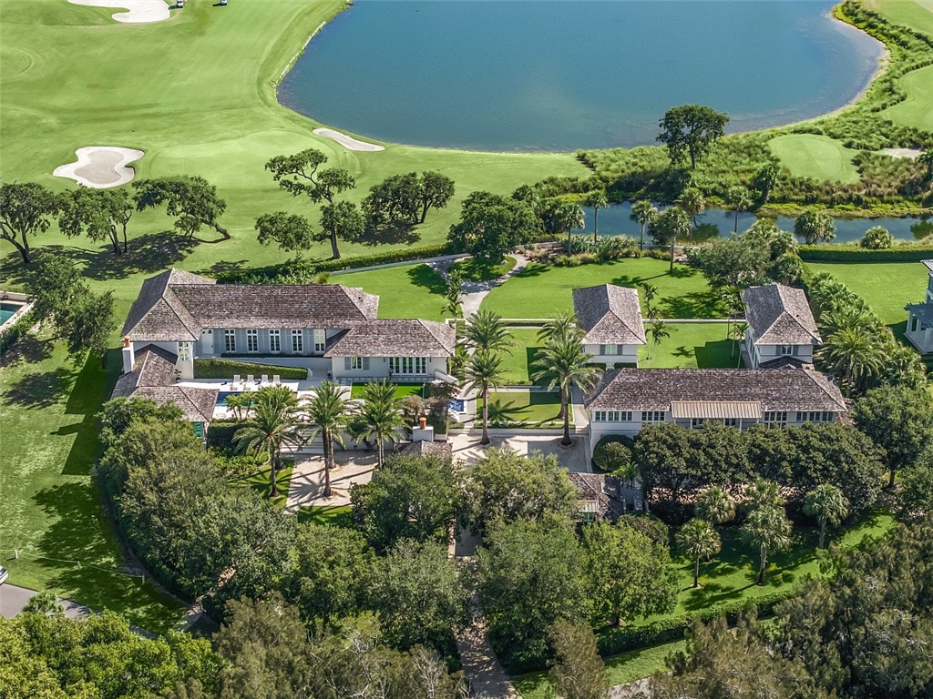 3340 Savannah Drive Vero Beach, FL 32963 - Photo 11 of 35 an aerial view of a house with a yard