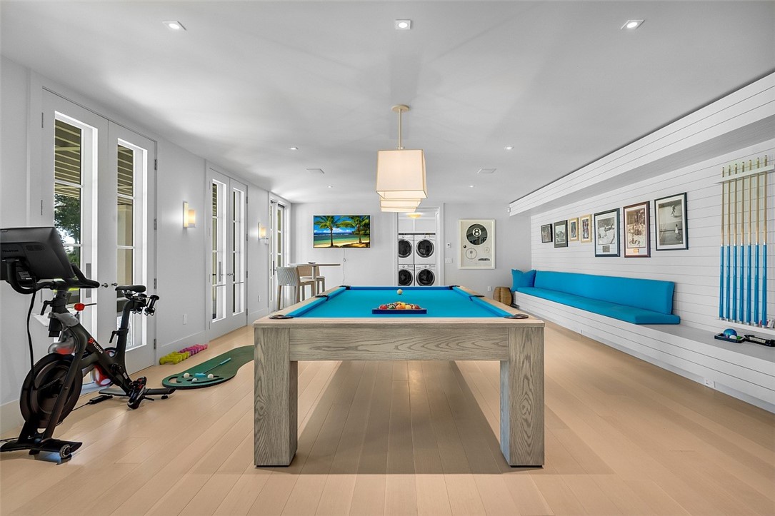 3340 Savannah Drive Vero Beach, FL 32963 - Photo 15 of 35 a room with gym equipment and windows