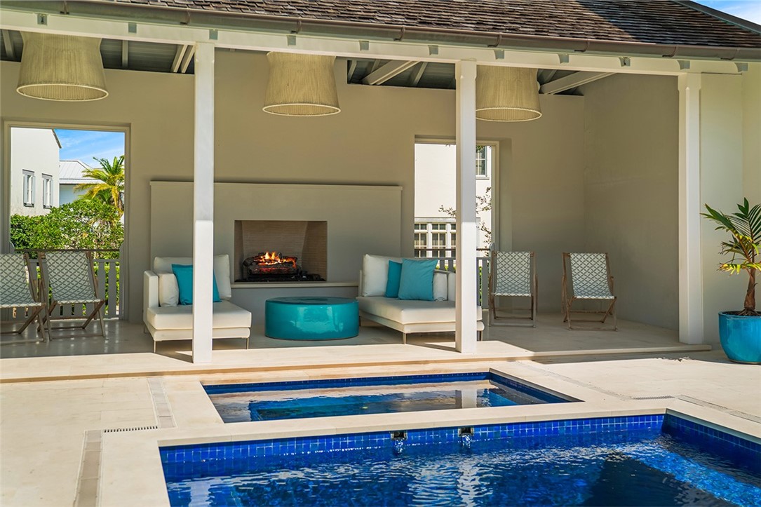 3340 Savannah Drive Vero Beach, FL 32963 - Photo 19 of 35 a living room with furniture and a fireplace