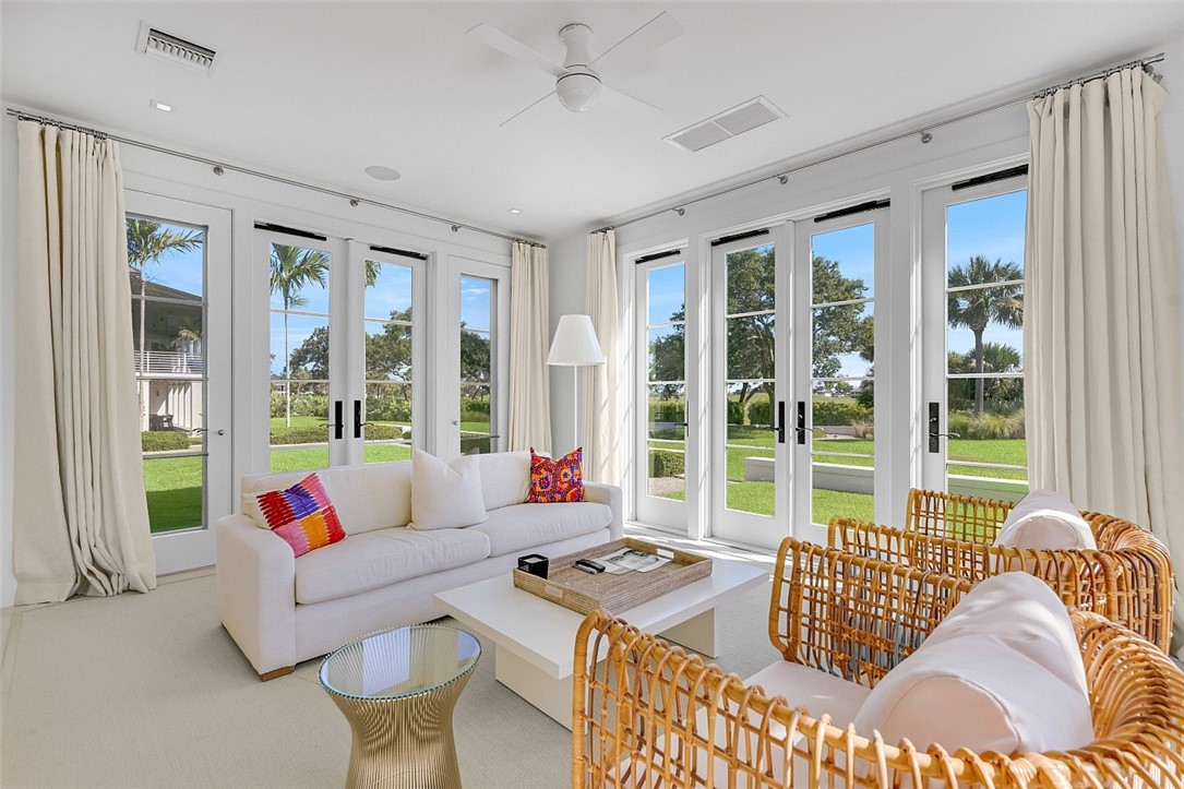 3340 Savannah Drive Vero Beach, FL 32963 - Photo 23 of 35 a living room with furniture and a large window