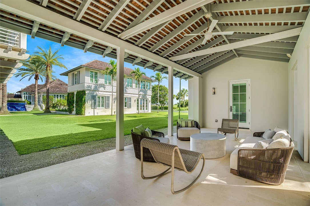 3340 Savannah Drive Vero Beach, FL 32963 - Photo 28 of 35 a building outdoor space with patio furniture and garden