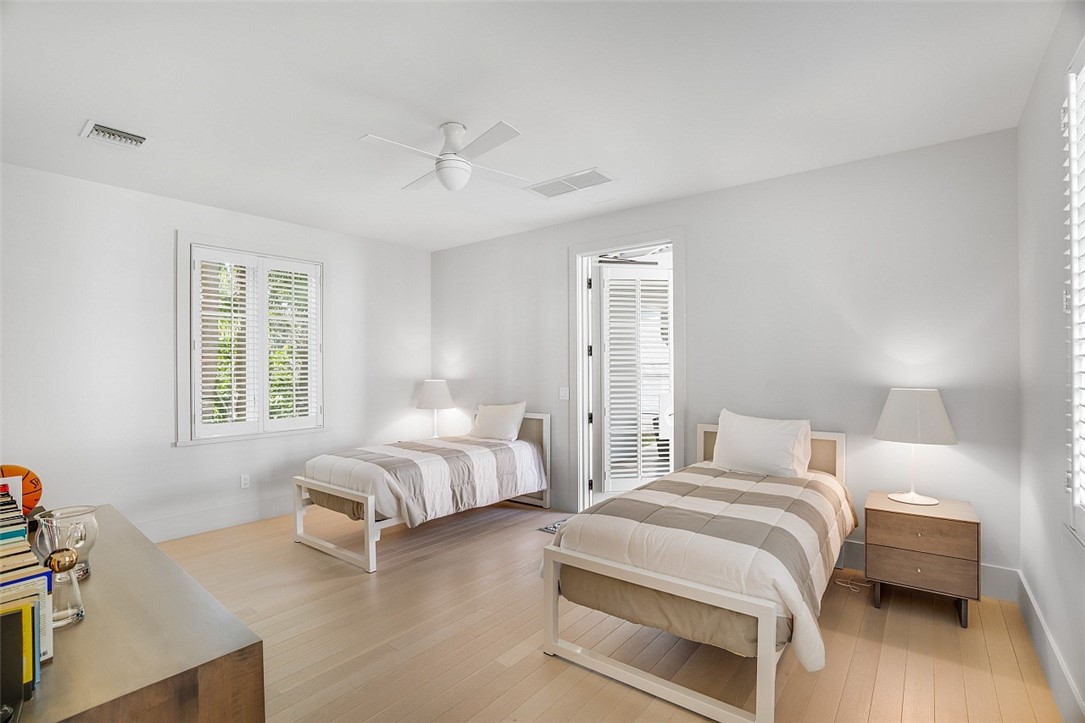 3340 Savannah Drive Vero Beach, FL 32963 - Photo 31 of 35 a bedroom with bed and a window