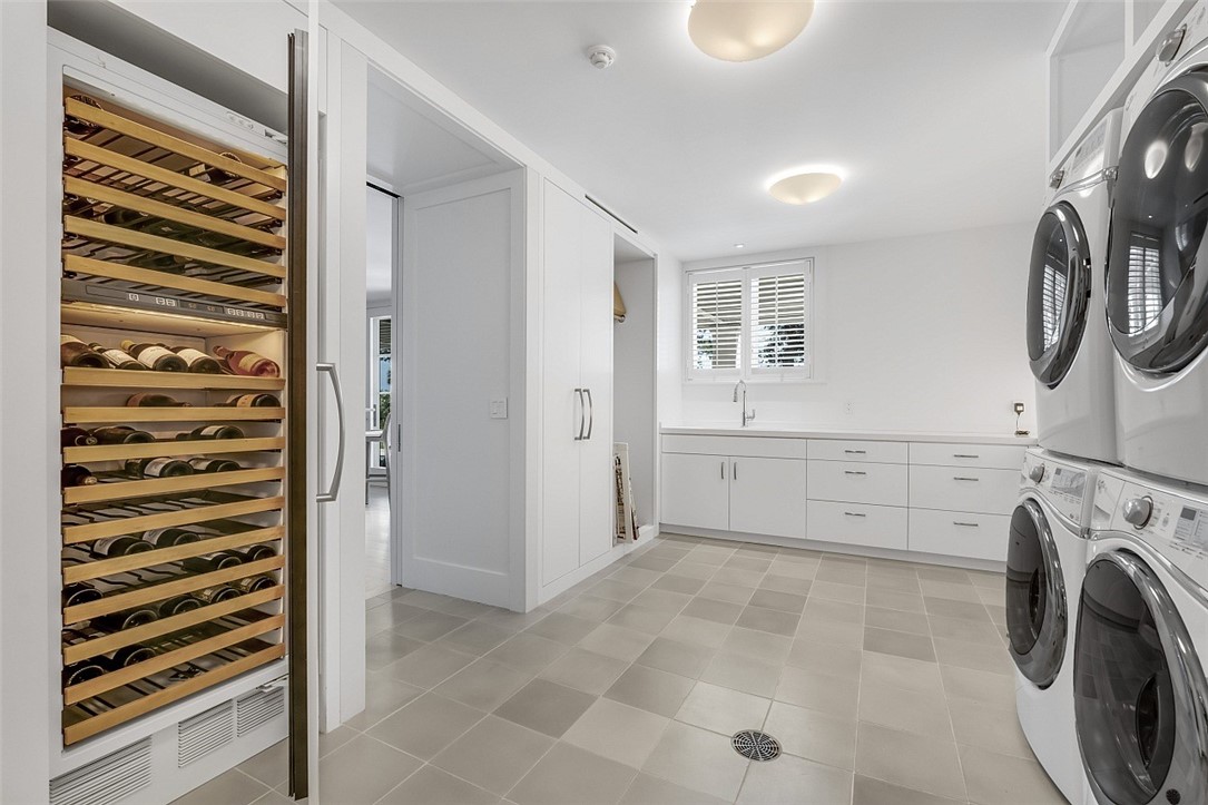 3340 Savannah Drive Vero Beach, FL 32963 - Photo 33 of 35 a view of a storage & utility room with washer and dryer