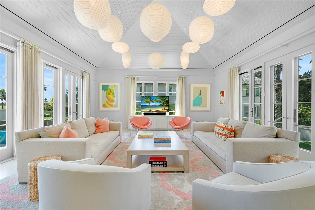3340 Savannah Drive Vero Beach, FL 32963 - Photo 7 of 35 a living room with patio furniture and a large window