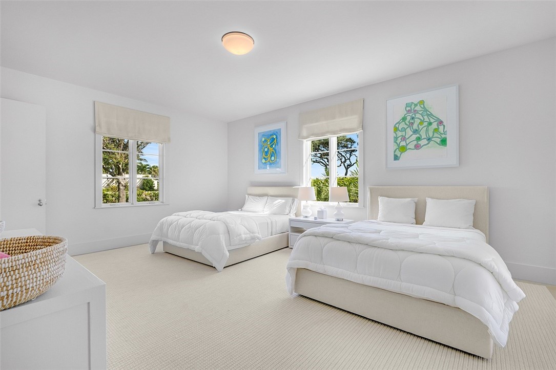 3340 Savannah Drive Vero Beach, FL 32963 - Photo 10 of 35 a bedroom with a bed and a couch