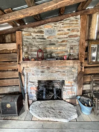 a stove top oven sitting inside of a kitchen